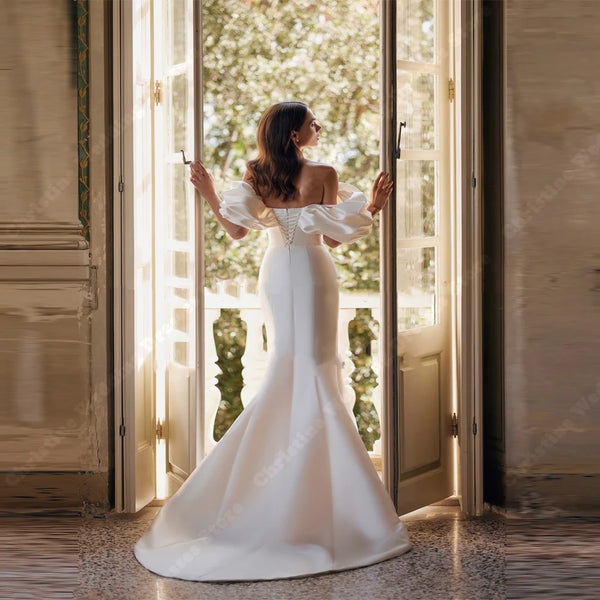 Elegant Off Shoulder Mermaid Wedding Dress with Bishop Sleeves and Sweep Train